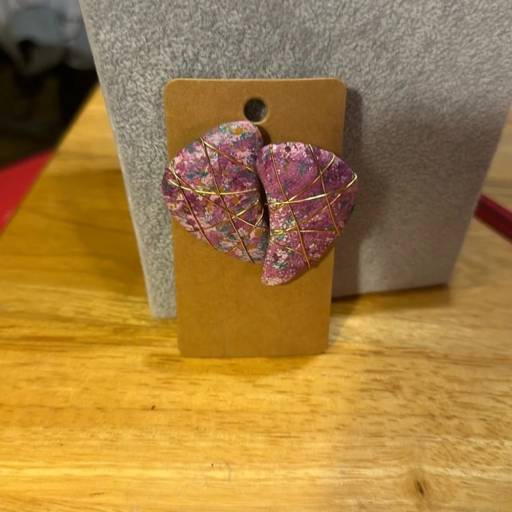 Vintage earrings. Leather and beautiful swirls of purple blue and pink,